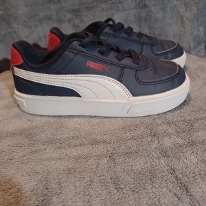 Puma slip ons size 10c Navy Blue, red and white.